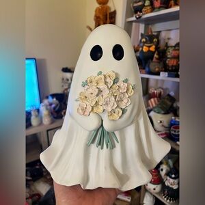 SPRING FLORAL GHOST HOLDING BOUQUET
